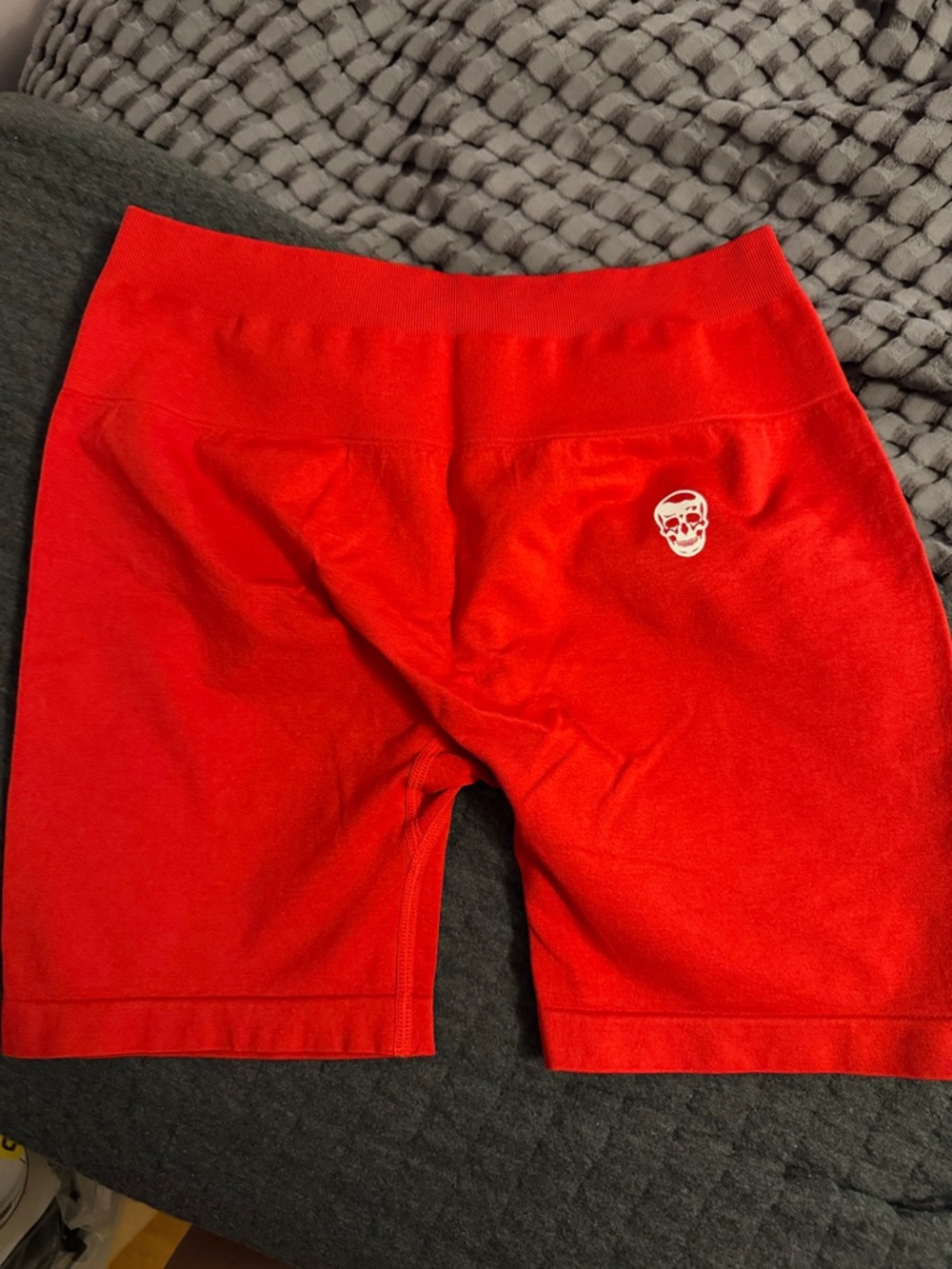 Gymreapers Women’s Red Athletic Bike Shorts with Skull Logo